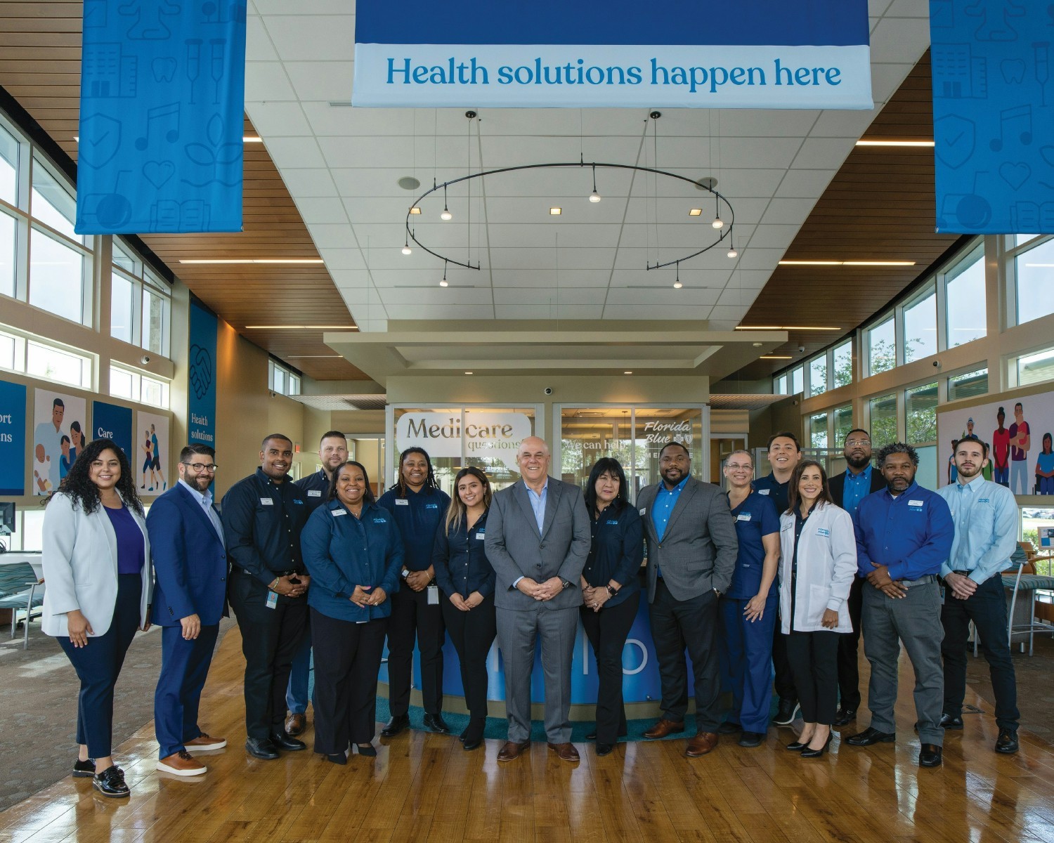 President and CEO, Pat Geraghty, with team members at one of Florida Blue's 33 Florida Blue Center locations