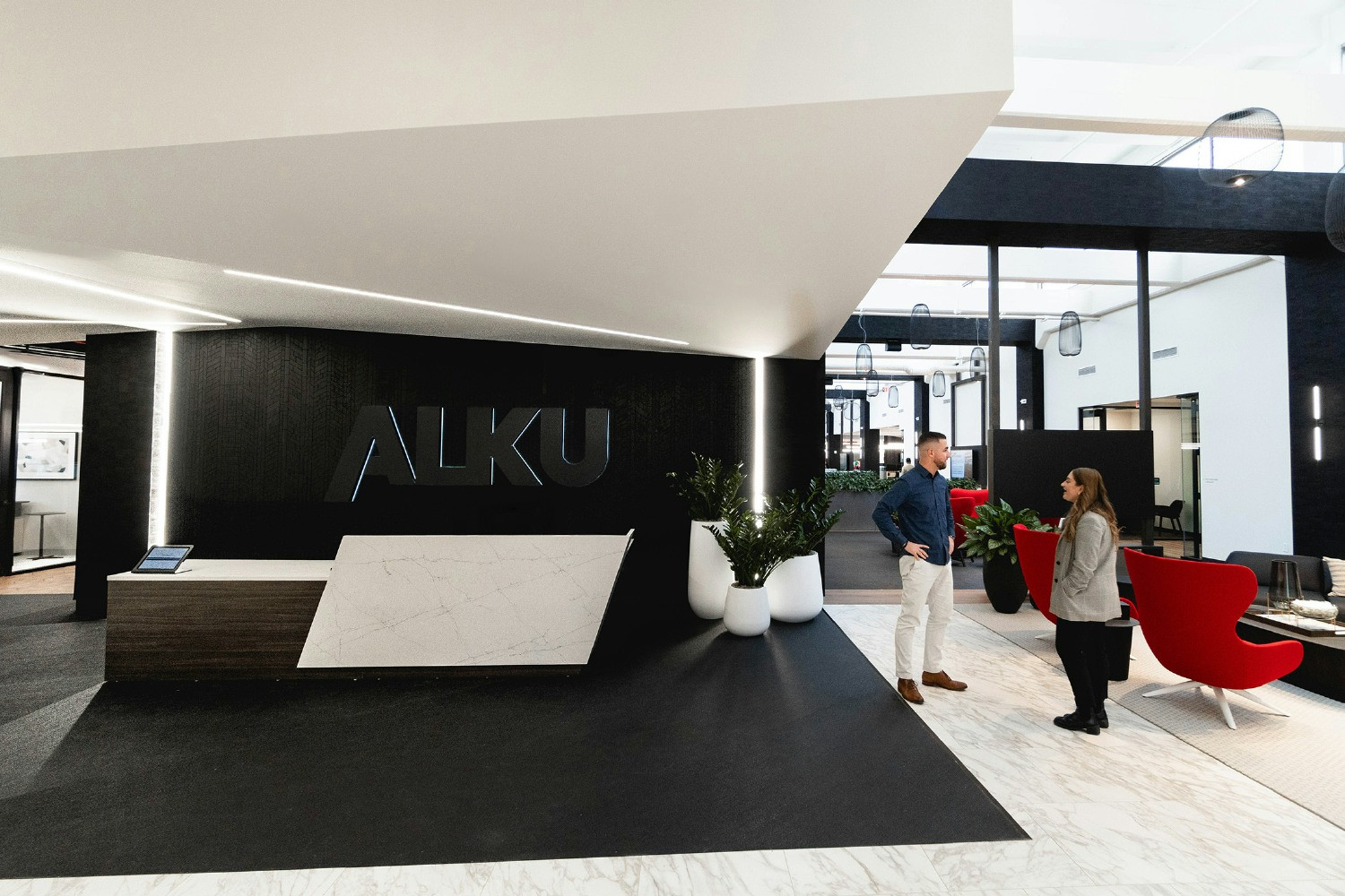 ALKU's front desk in the Andover Headquarters welcomes visitors as soon as they enter the office. 