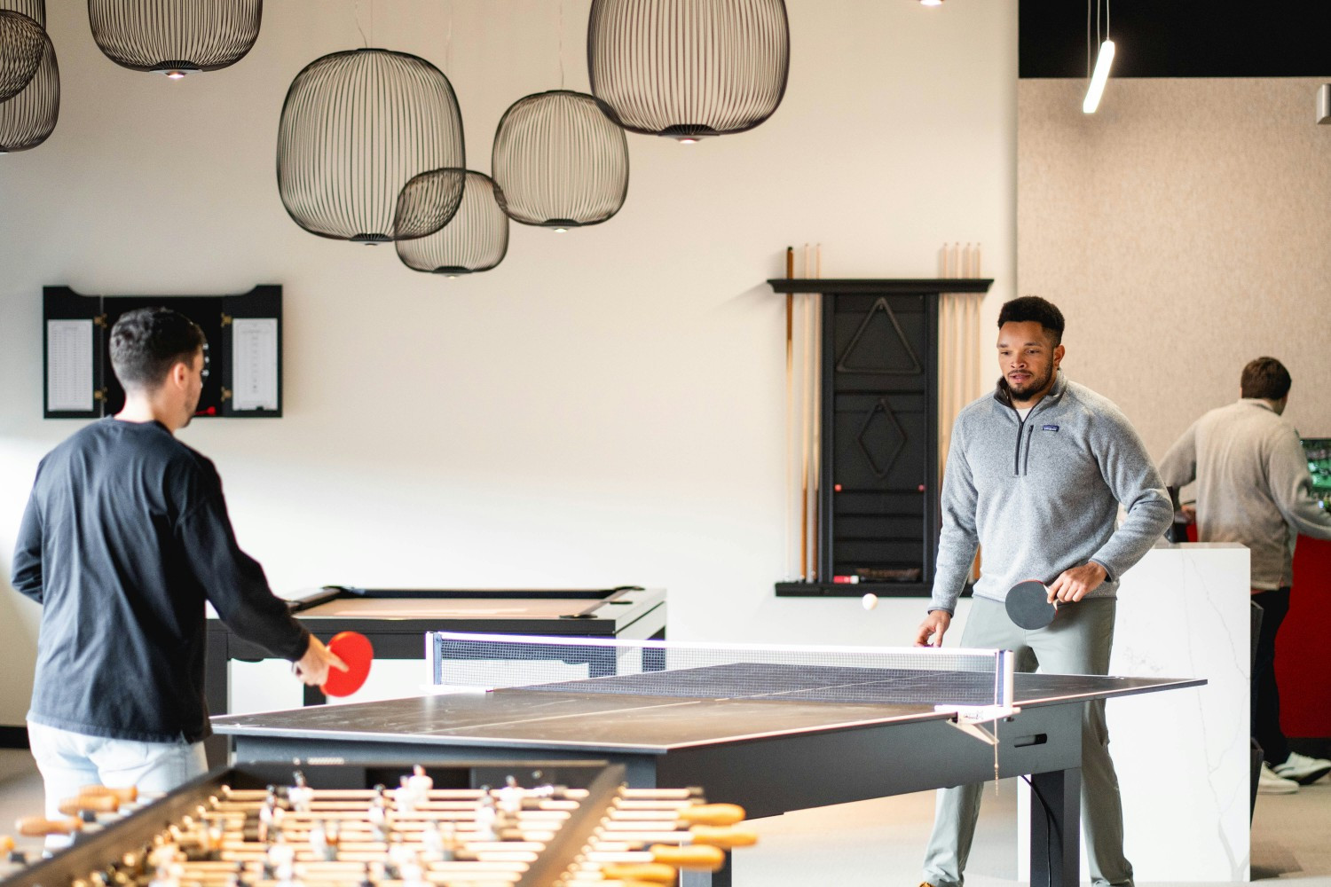 ALKU's Andover office includes a game area where employees can take a break in the day to relax with their coworkers. 
