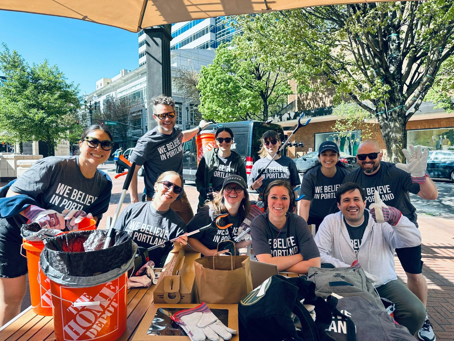 Uplifting our communities is a core value. Team members join a clean up day to reinvigorate downtown Portland.
