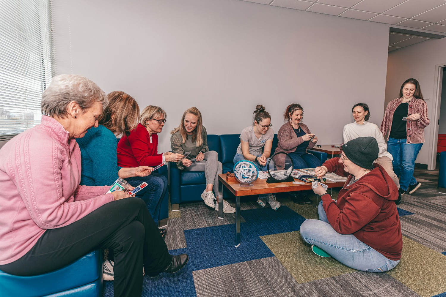 Employees enjoy time in one of Kitware's communal areas.