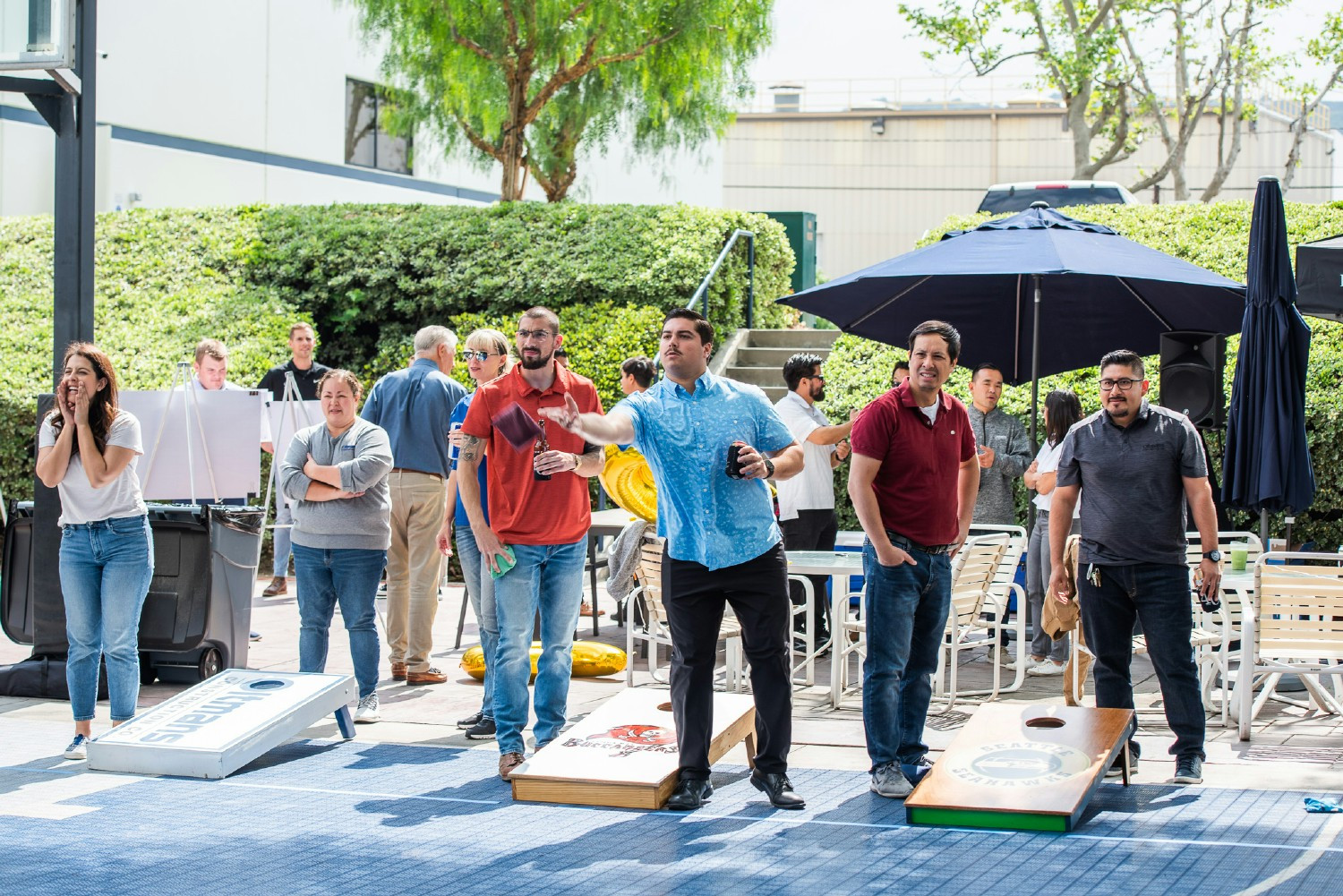 Summer lunches and corn hole tournaments at our HQ office in Whittier