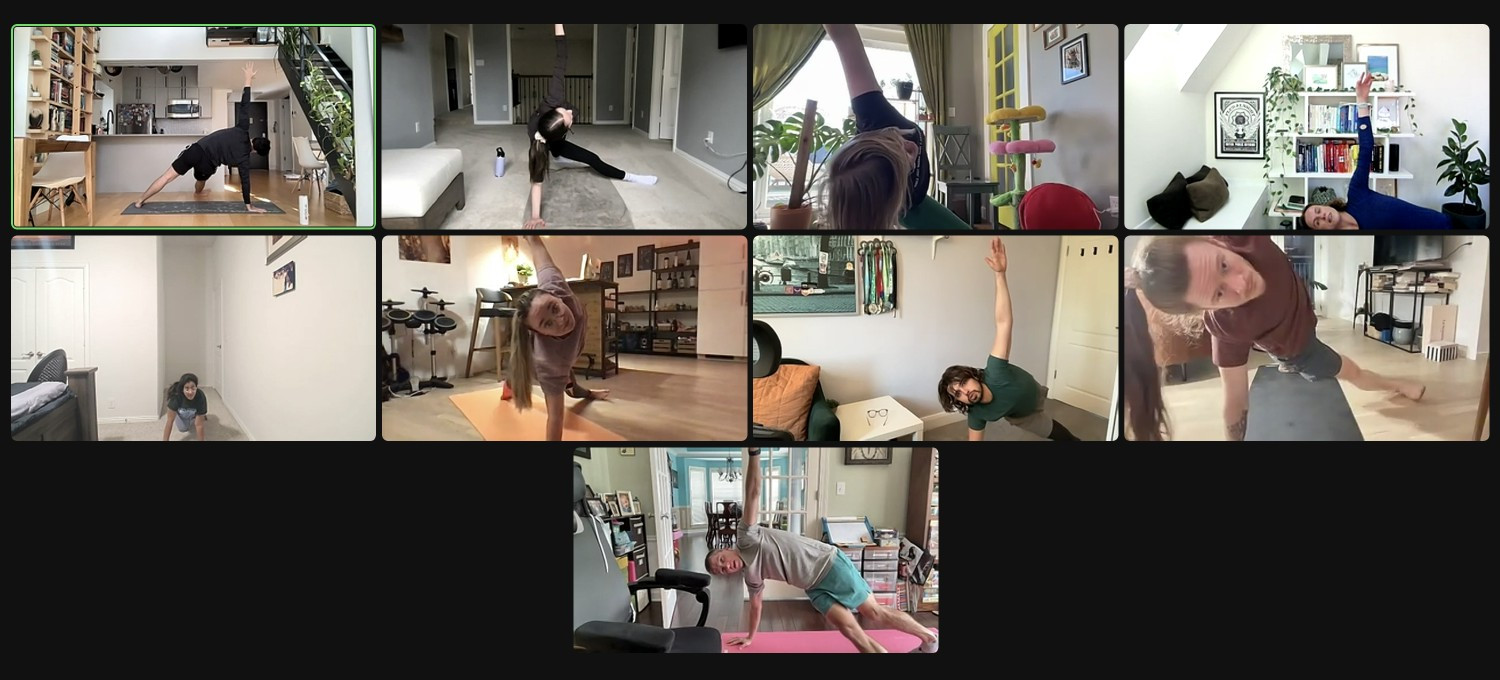 Team members participating in a virtual yoga class
