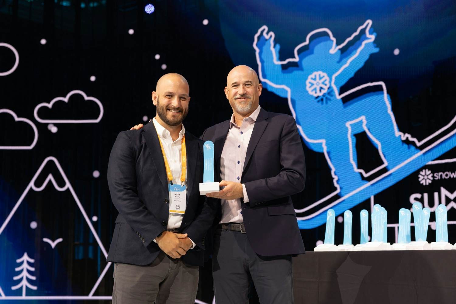 Our Head of Partnerships and Marketing accepting the Partner of the Year Award at the 2023 Snowflake Summit