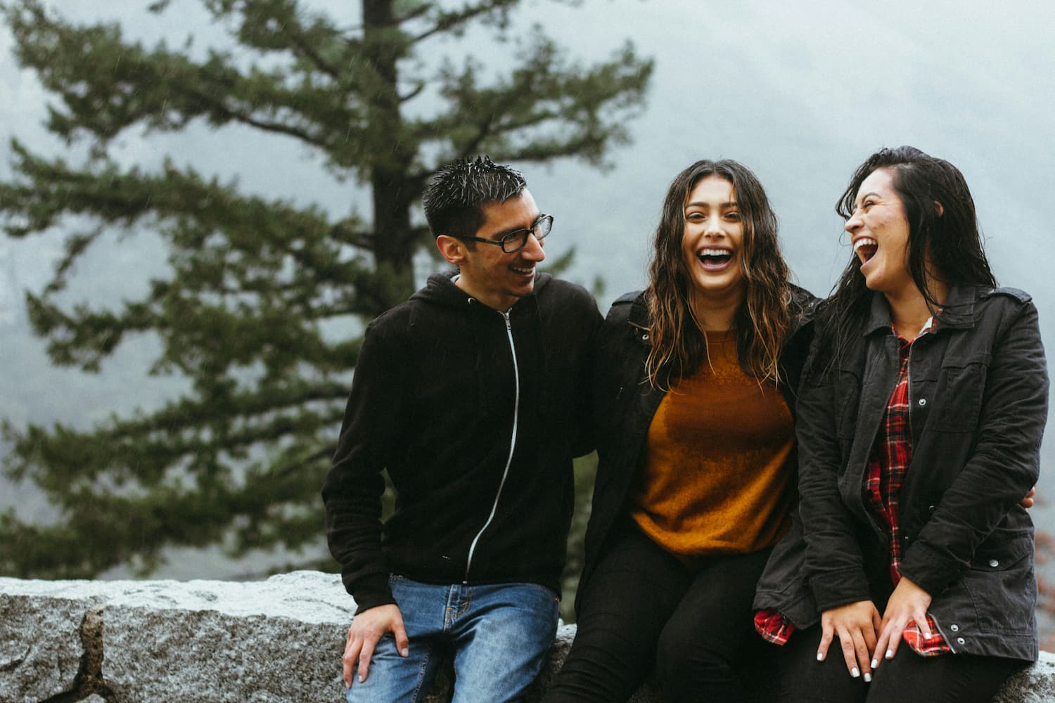  Three Hispanic people sharing a moment together