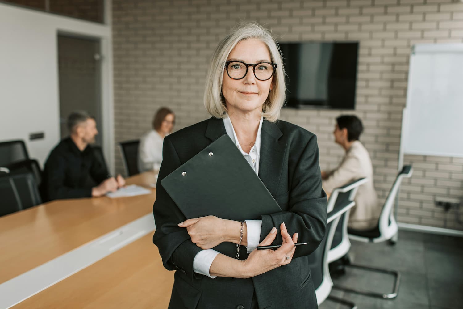  Mid-fifties woman in the workplace