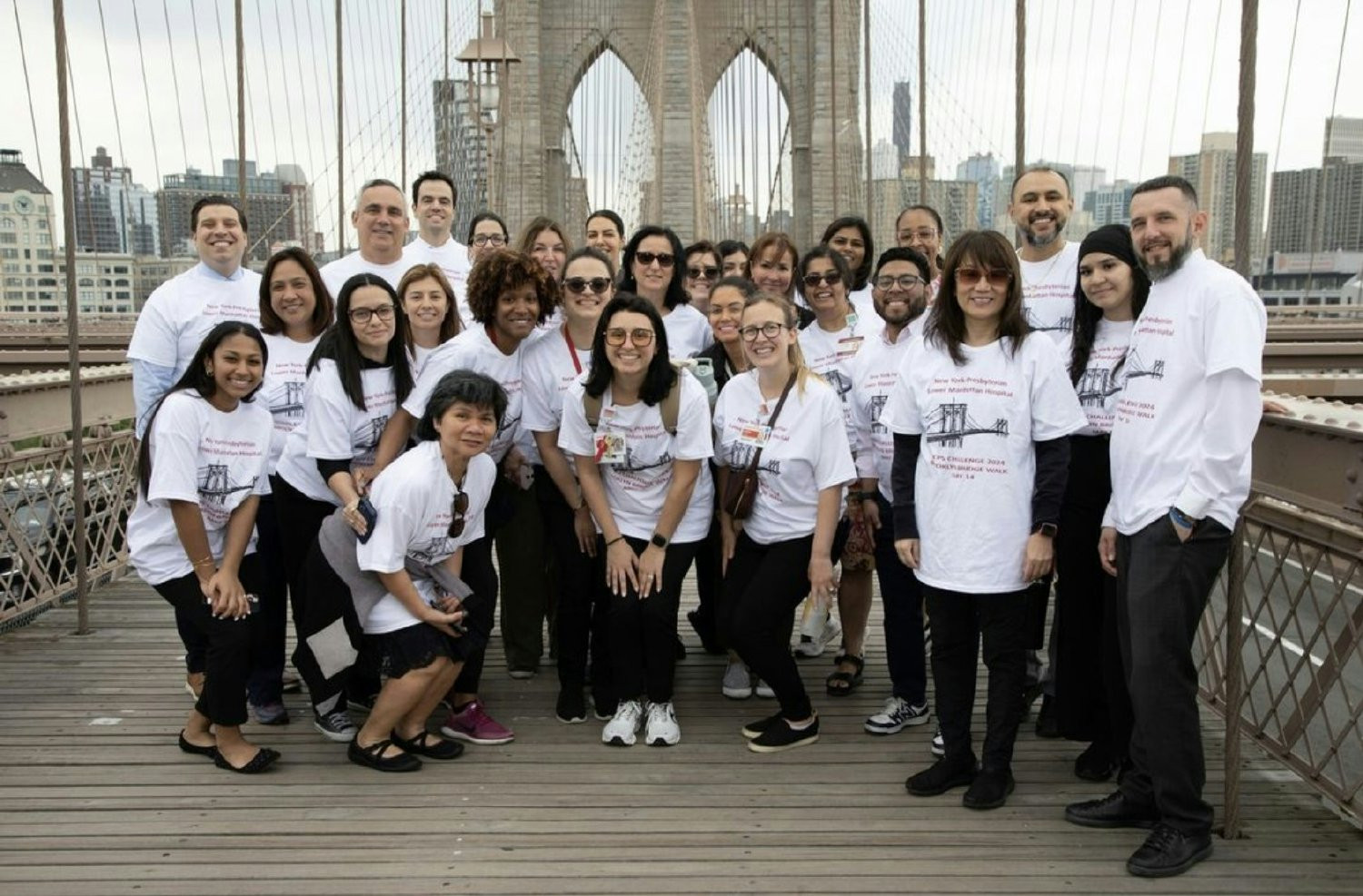 Team members from NYP Lower Manhattan walked across the Brooklyn Bridge for a group steps challenge.  