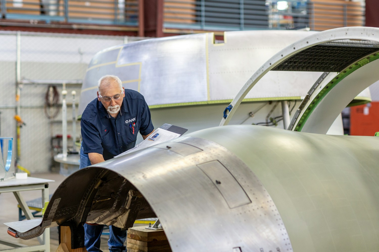 AAR team members inspecting an airplane component at their Component Services facility in Hot Springs, Arkansas. 