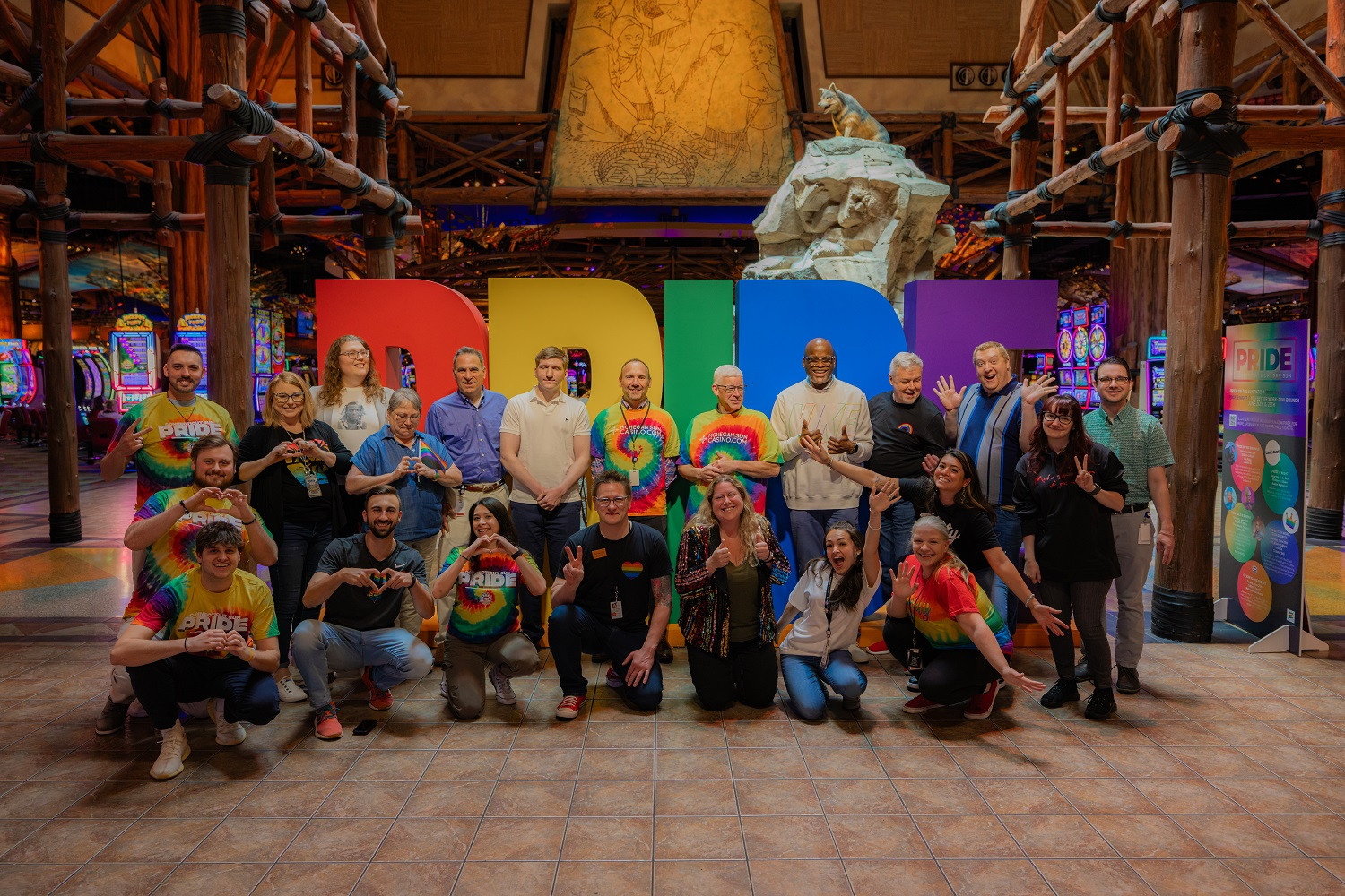 Our Team Members gathering together to celebrate Pride Month! 