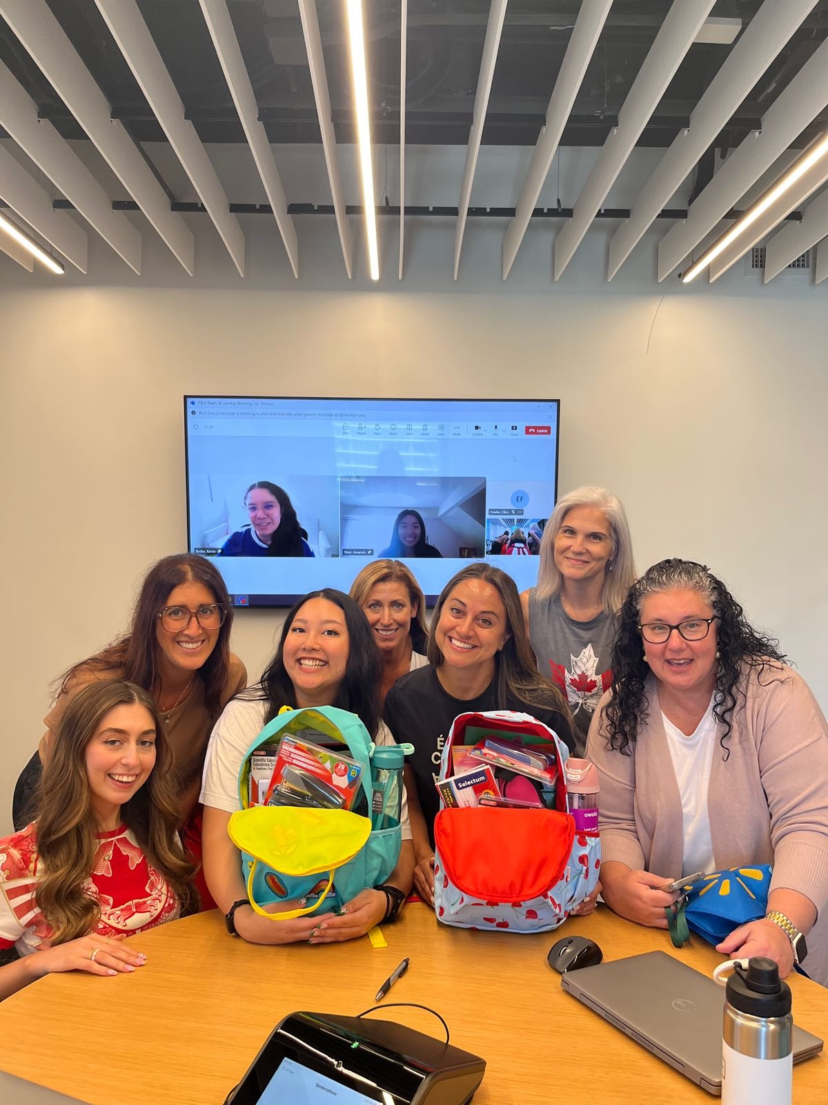 Caregiving backpack initiative - our teams happily participating in donating school supplies to those in need