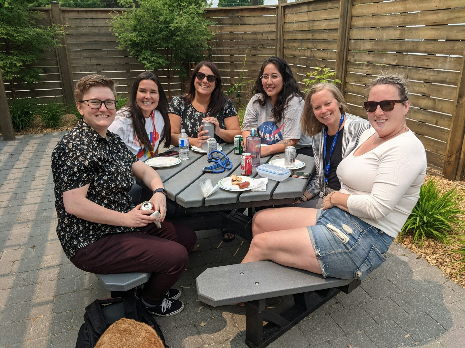 Enjoying some lunch at our Rainbow Day BBQ fundraiser hosted by our Queer360 Community (ERG)