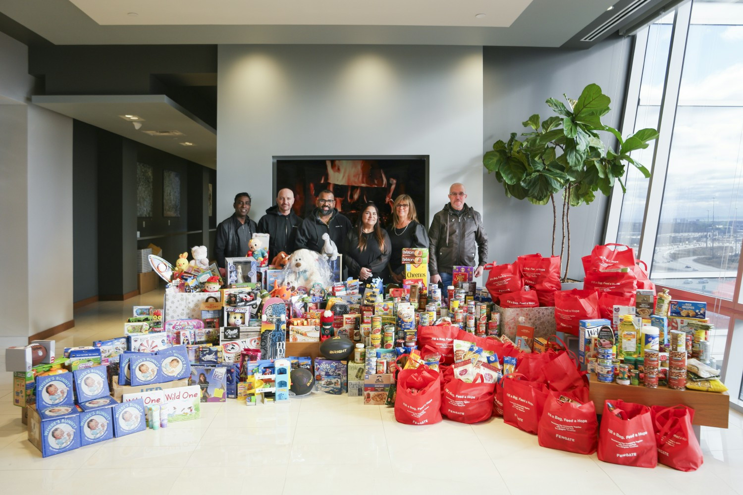 Fengate employees with donations for the annual holiday food and toy drive.