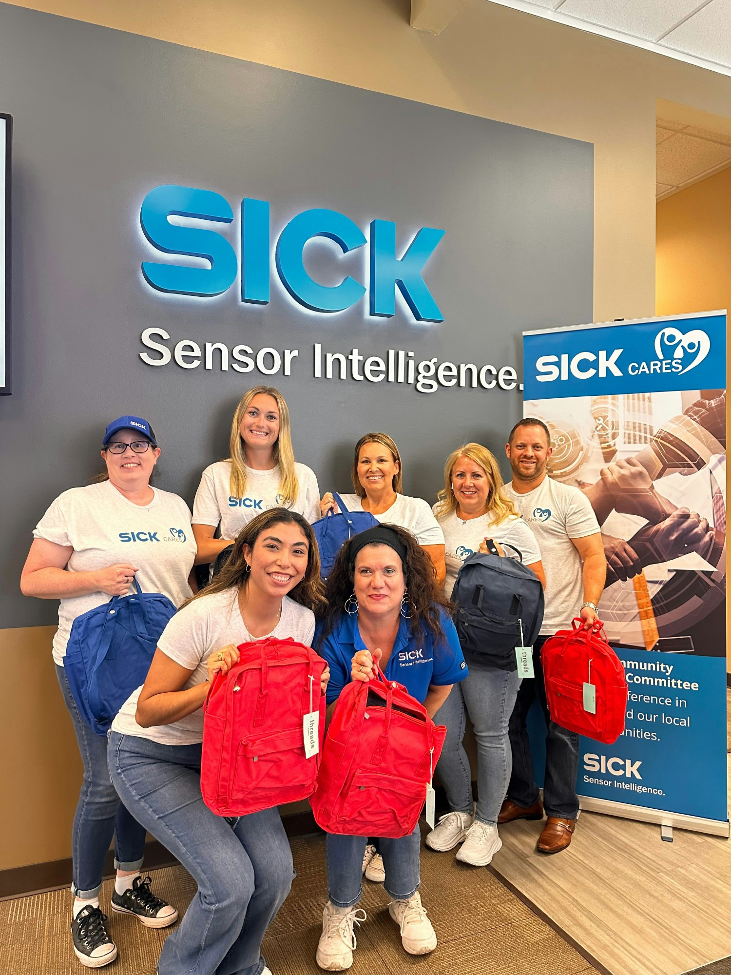 SICK CARES Day 2023 - The Houston team packing backpacks with school supplies for children in need.