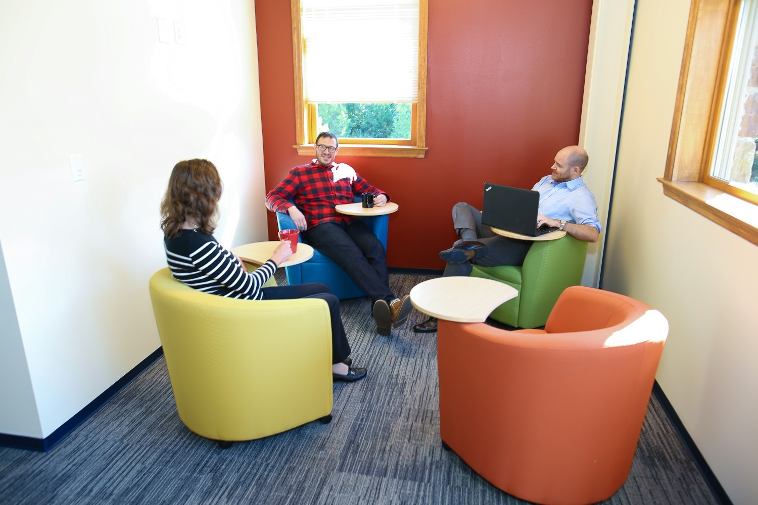 Colleagues enjoying the collaborative spaces in our US office 