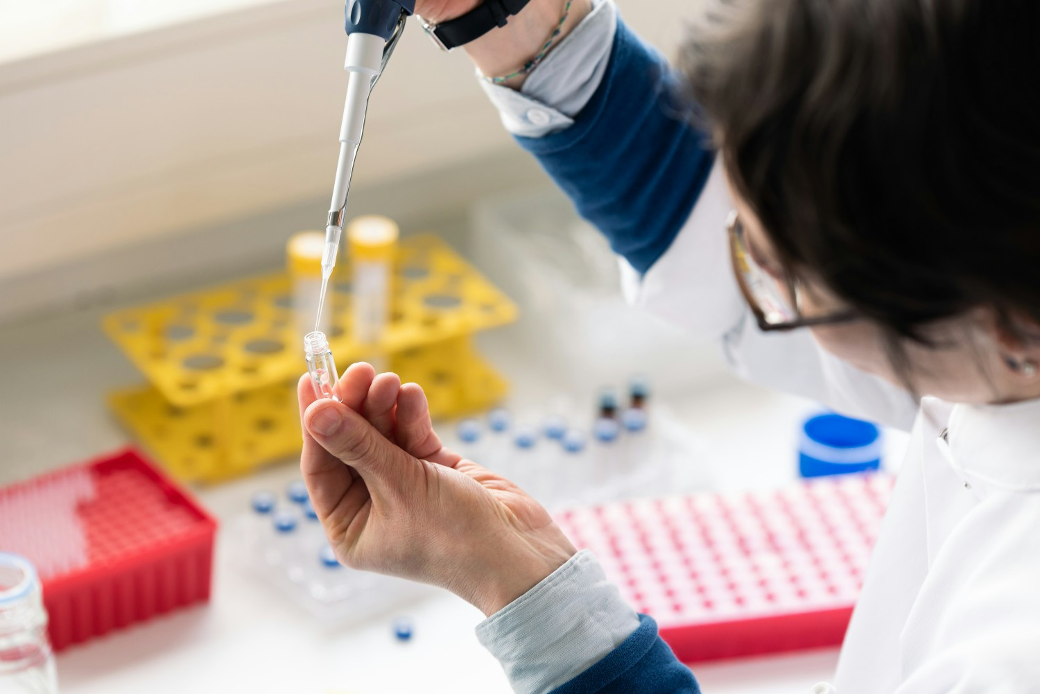 Silence scientist filling drug substance in the company’s Berlin laboratory.