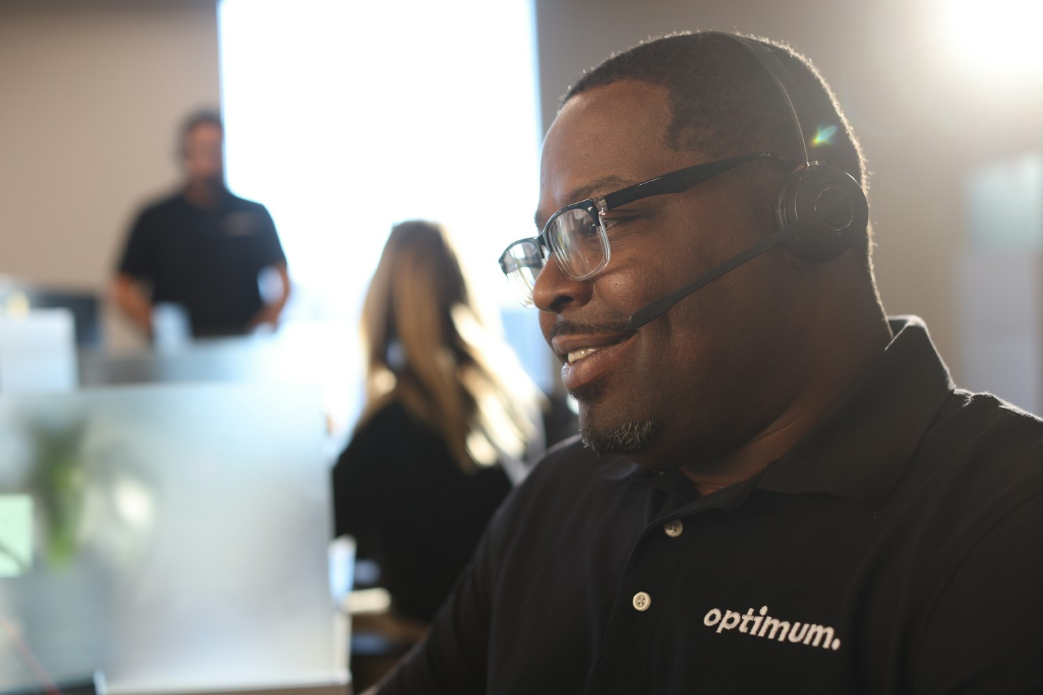 Optimum Customer Care Agent at one of Optimum’s Call Centers 