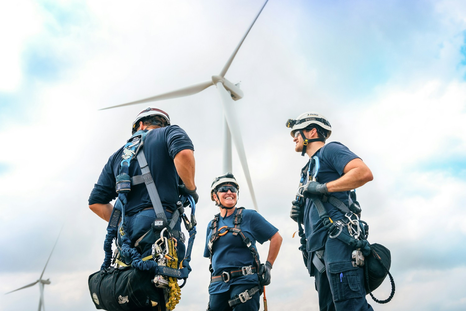 Vestas service technicians at a wind farm in Kansas getting ready to go up a wind turbine to perform maintenance work