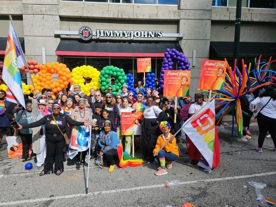 Piedmont employee volunteers and family walk in the annual Atlanta Pride Parade in support of the LGBTQ+ community.