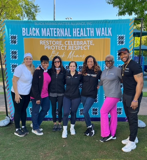 The VP of DE&I, a few DE&I Council Chairs, and other volunteers participate in the Black Maternal Health Walk.