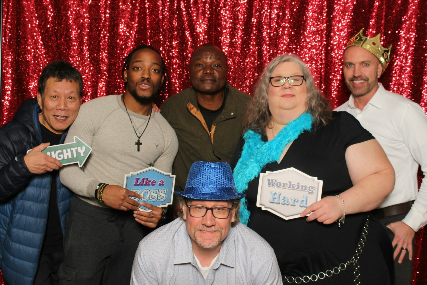 Employees enjoying the photo booth at our Annual Party