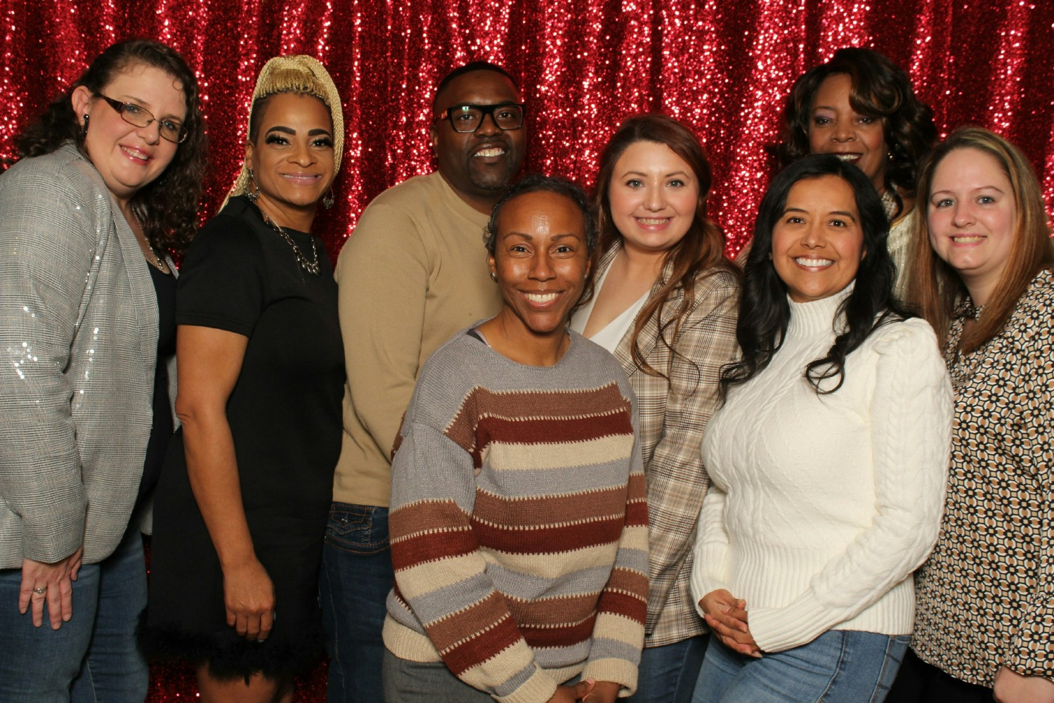 Employees enjoying the photo booth at our Annual Party