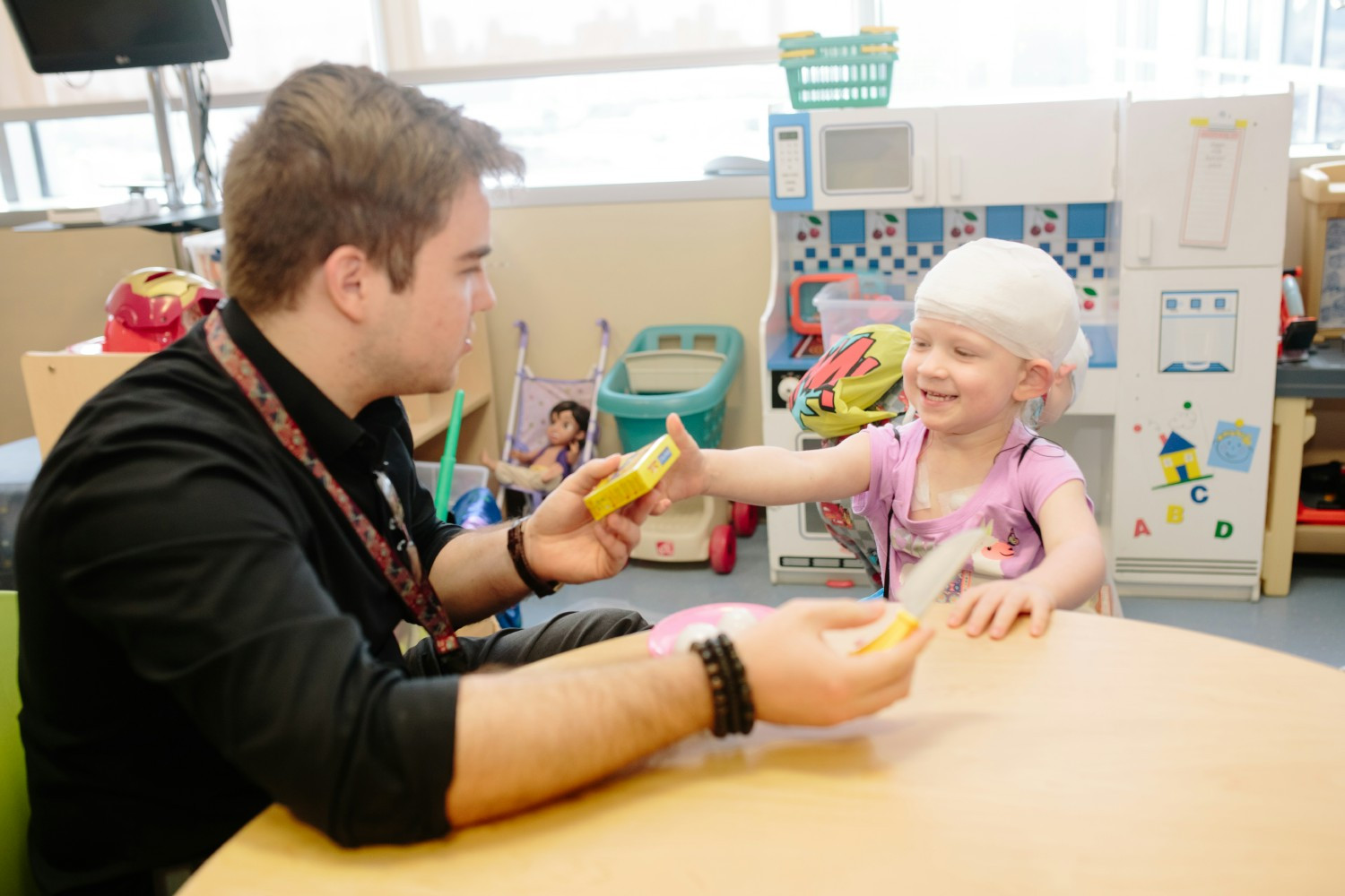 Child Life assistants create opportunities to play in the hospital playroom to provide a positive patient experience. 