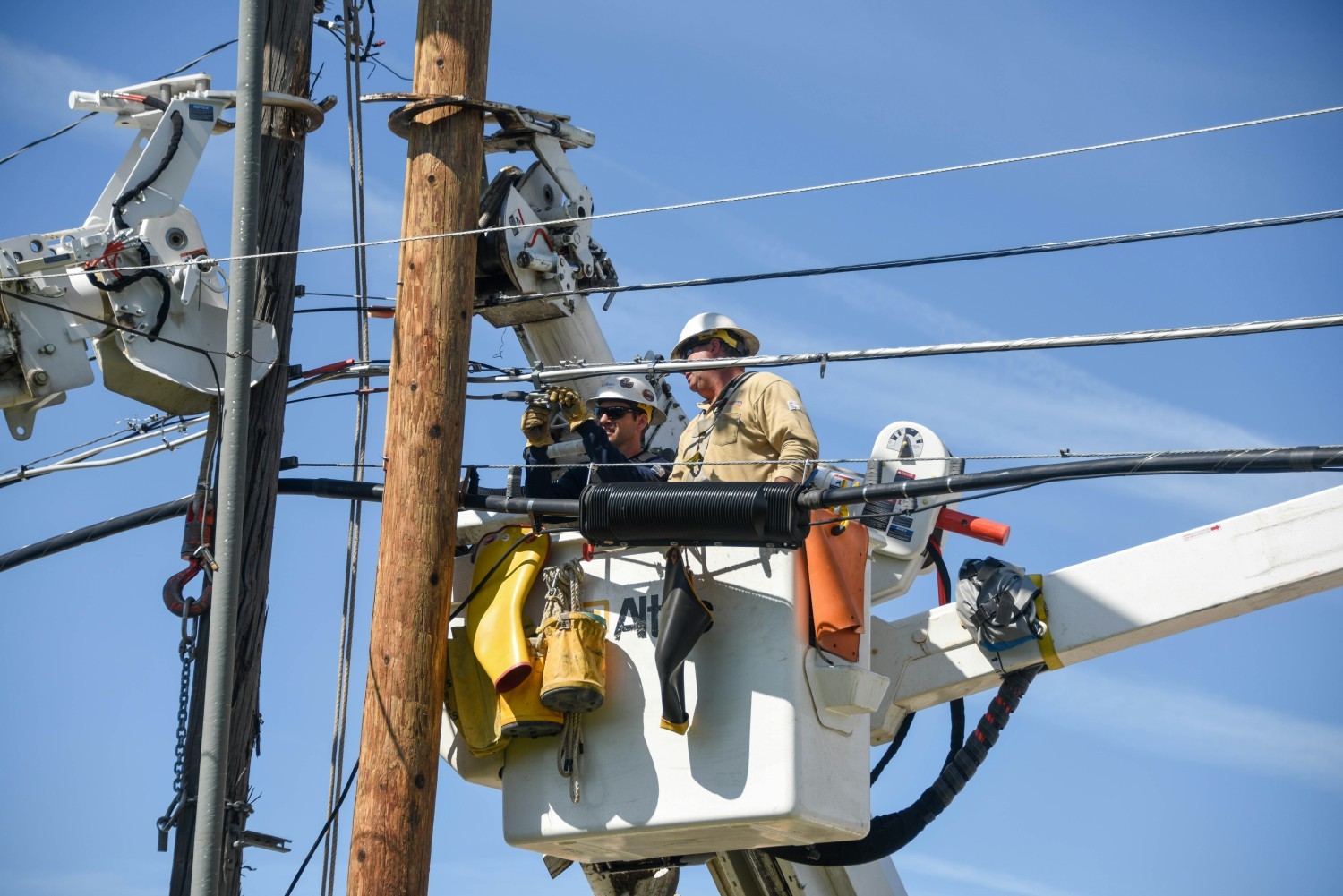 Line workers respond to restore power after a wind storm in Great Falls, Montana.