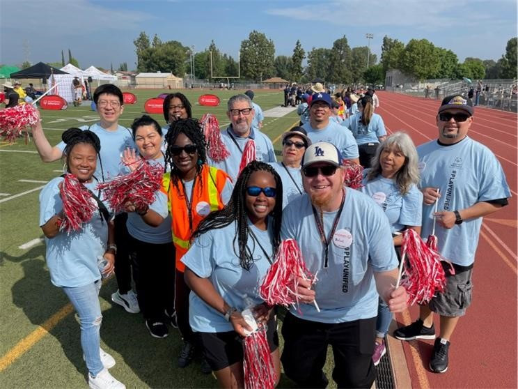 Employee volunteers at a special olympics event in Valencia, CA.