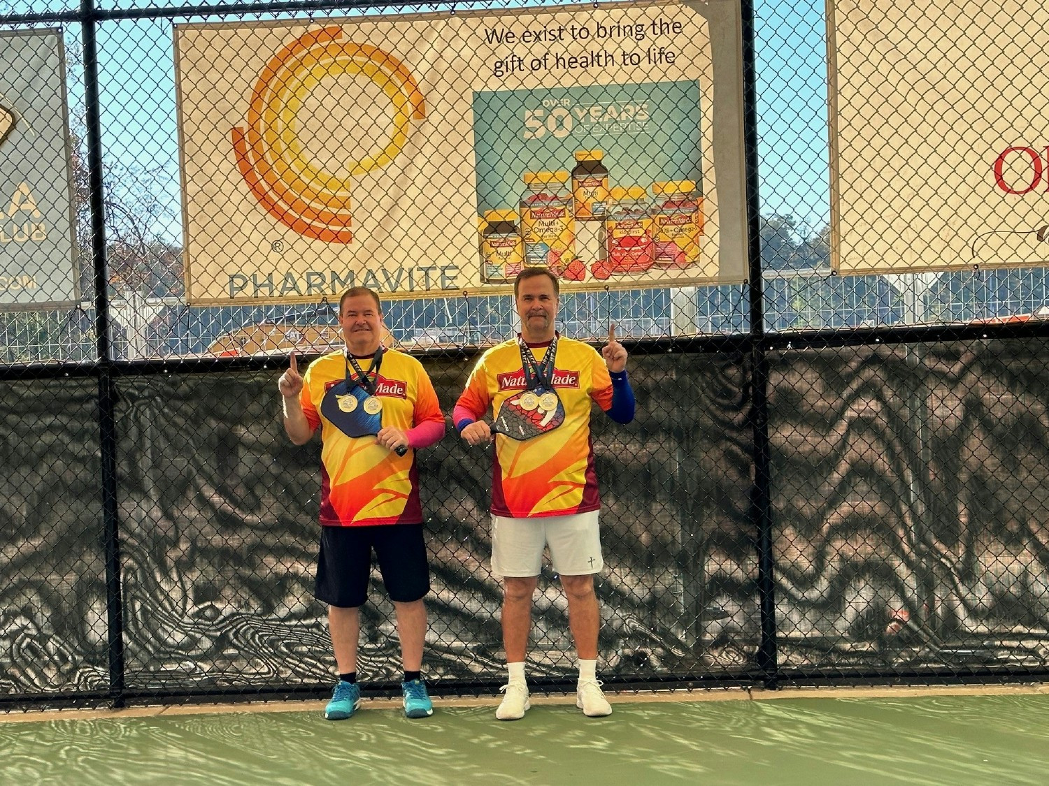 Employees playing in a pickleball tournament at a local sports complex where Pharmavite is a corporate sponsor.