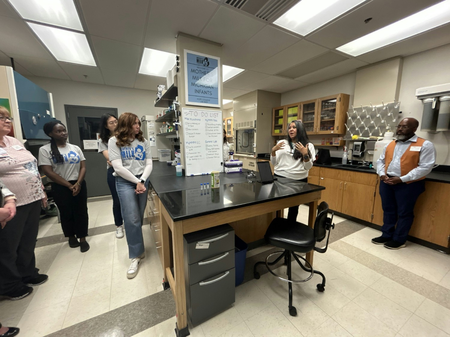 Hope College faculty with students in research laboratory.