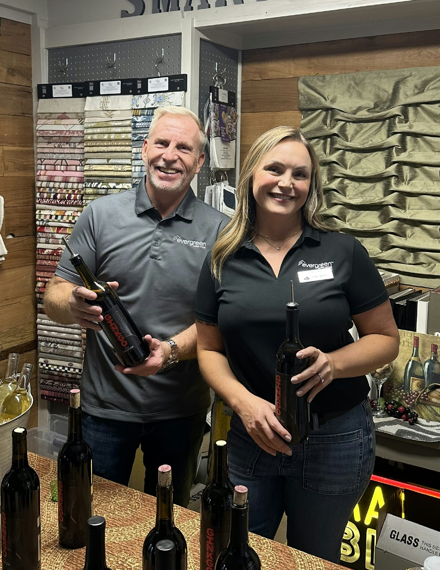 EVP of Production, Robert Lipston, and Branch Manager Siera Jay at an Enumclaw Chamber Wine Walk