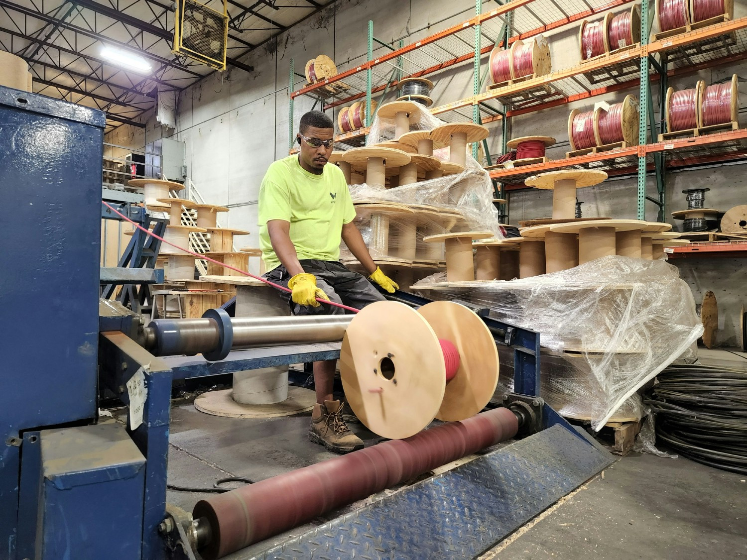 Wesco employee cutting wire in Kansas City, Kansas