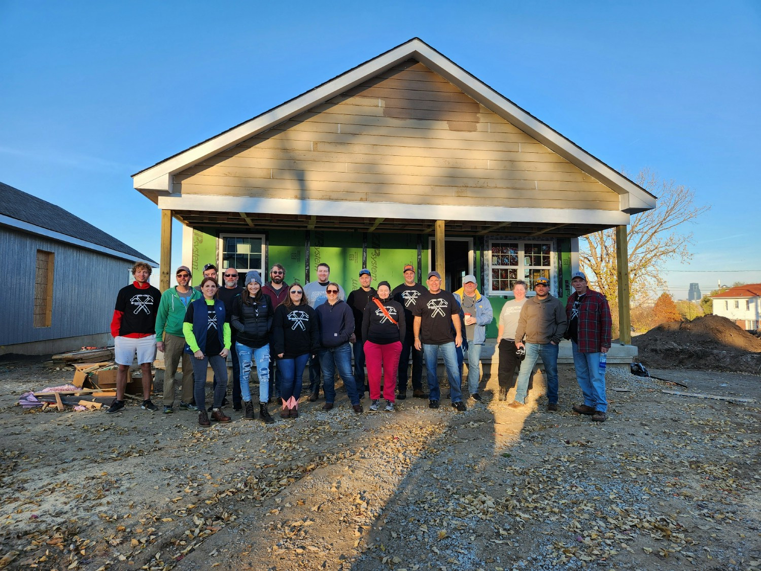 Wesco employee volunteers at one of 100 planned Habitat for Humanity builds in celebration of Wesco's 100th anniversary