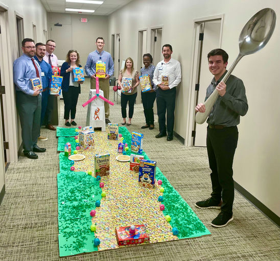 Employees are getting creative to surpass last years 6,000 boxes of cereal collected for Arkansas Foodbank.