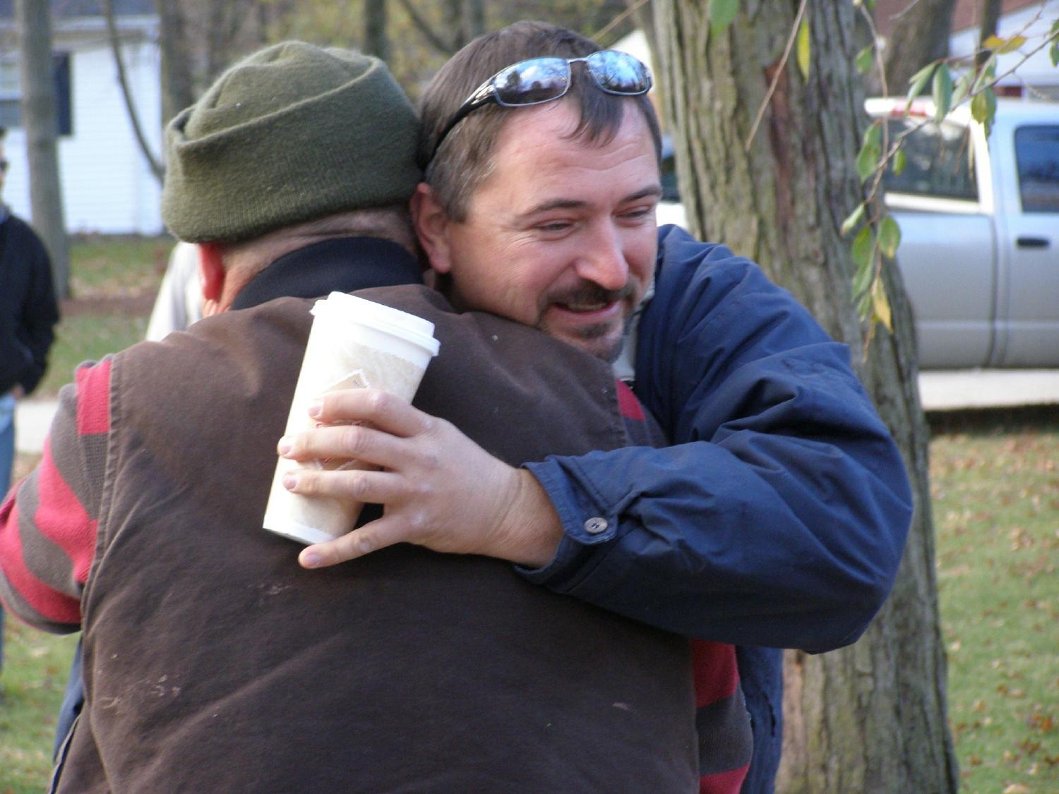  2010 HandyPro Give back day - Mark L. thanking Handyman Joe K. for volunteering to help him with his home repairs.