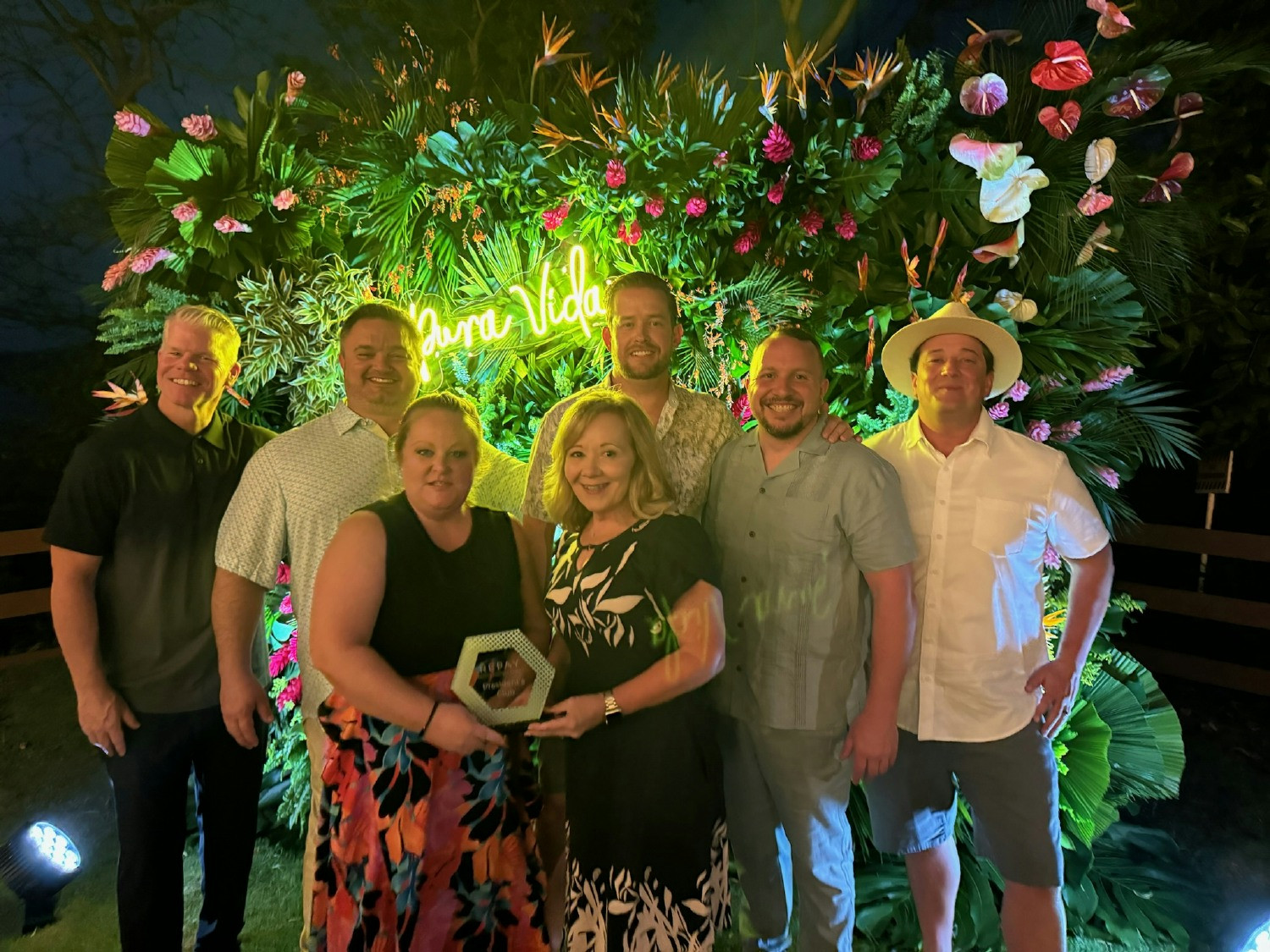 Sales team members being honored at REPAY's annual Presidents Club in Costa Rica