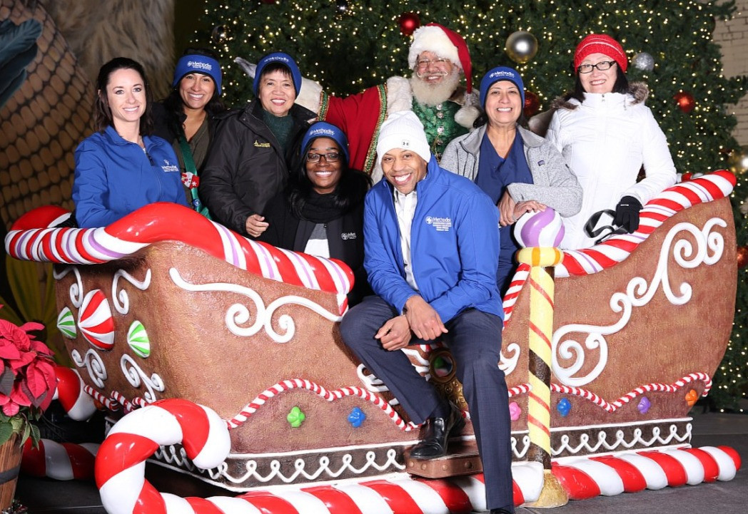 Methodist Charlton Medical Center volunteers at a hospital-sponsored holiday event in one of our served communities.