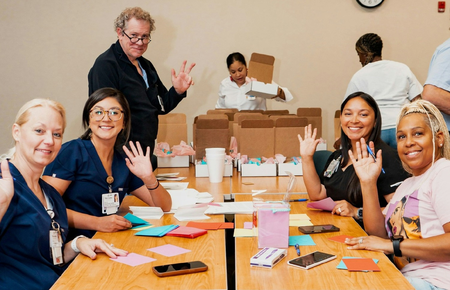 Methodist Dallas Medical Center's employees give their time to create care packages for the hospital's cancer patients.