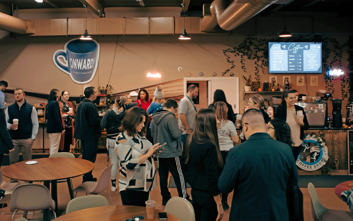 Employees gathering at the on-site Logistics Plus coffee shop.