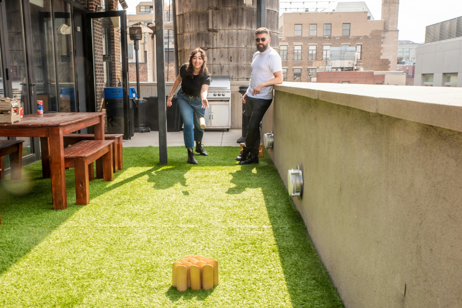 Playing Mölkky, a Finnish game, on our terrace. We work hard to accomplish great things, have fun while doing it!