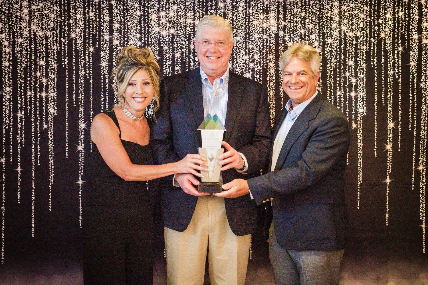 Chairman and CEO Ward Nye (center) annually recognizes Martin Marietta’s safest and most engaged operations.