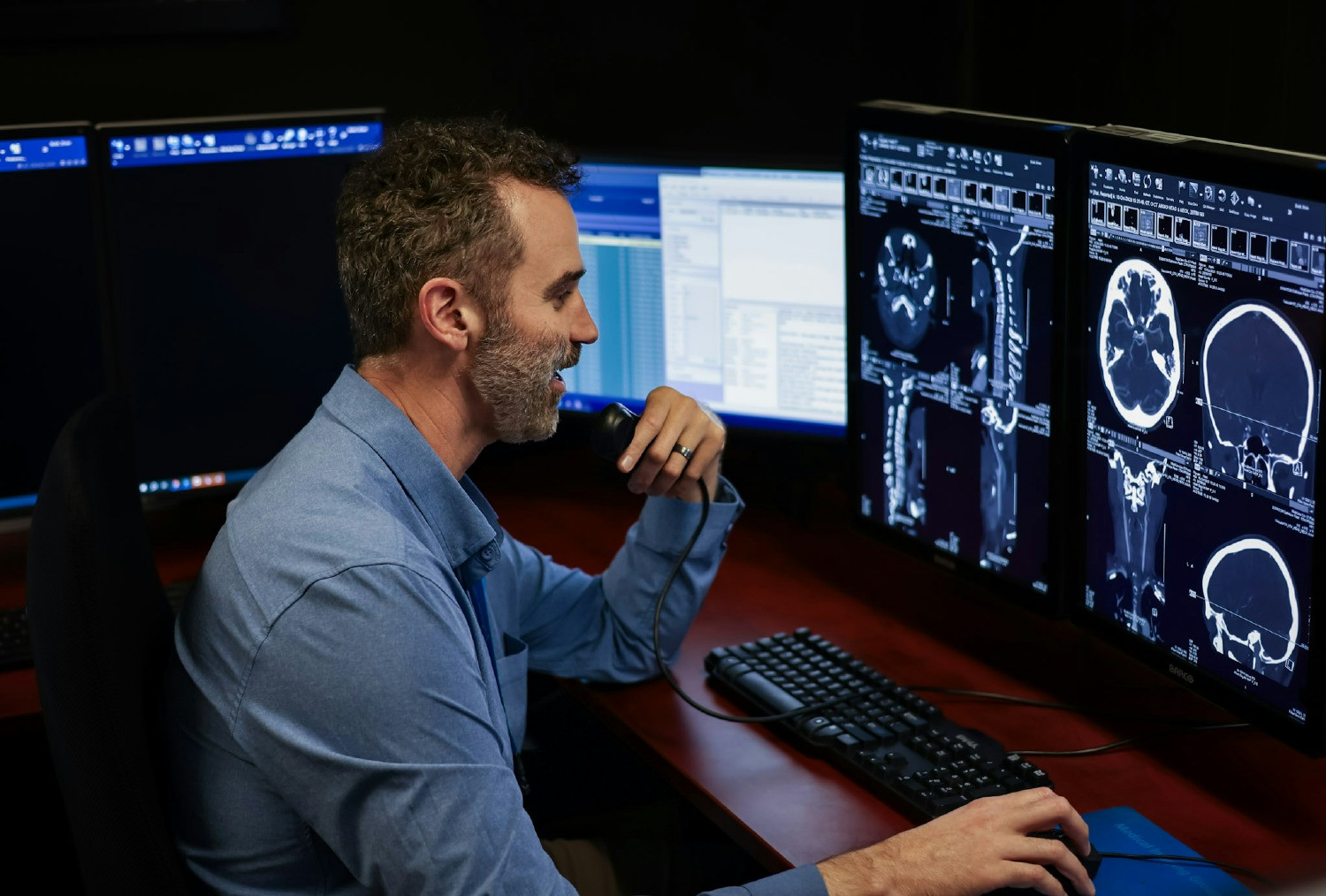 A neuroradiologist reading a patient's exam