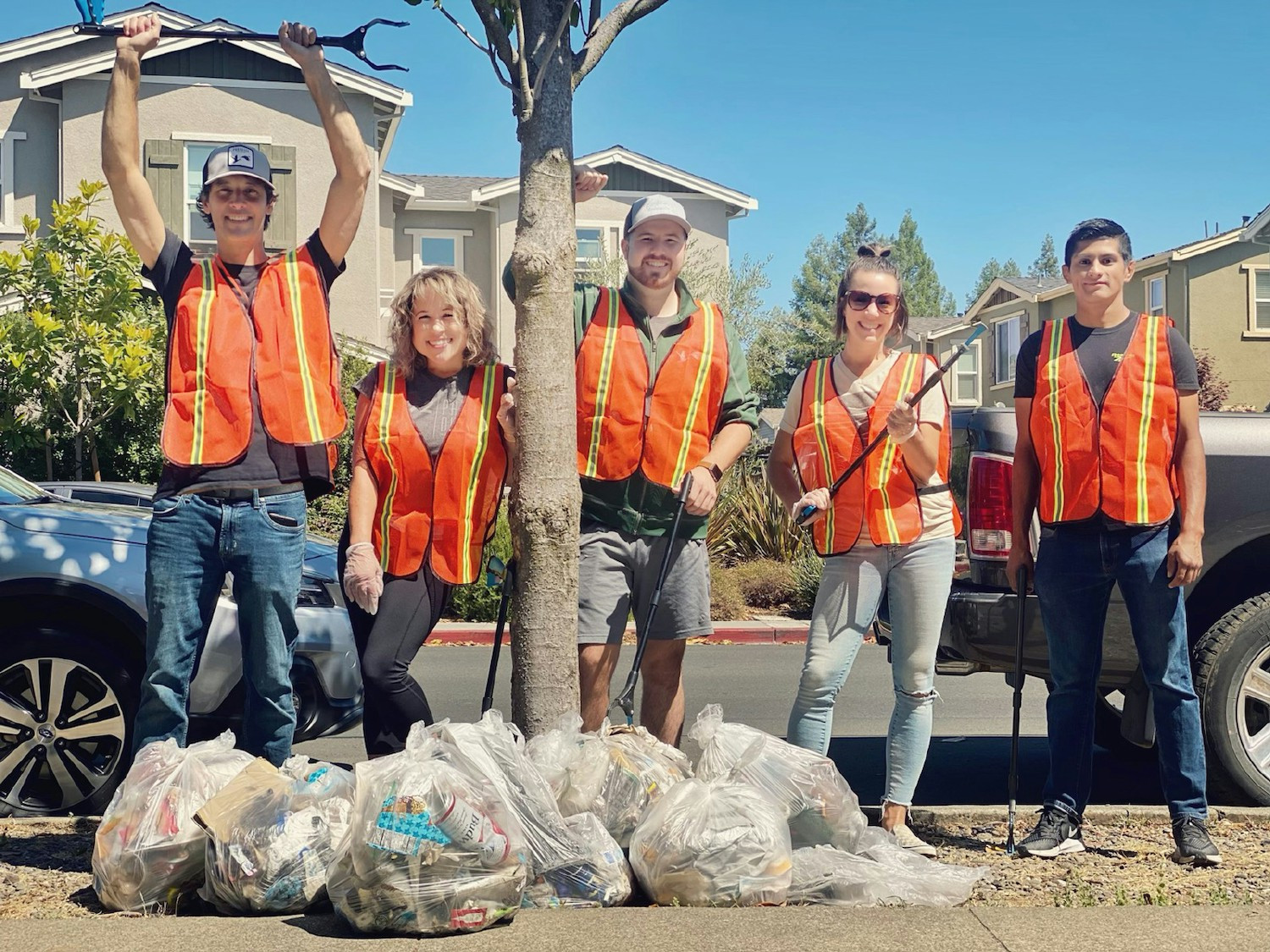 Employees working hard to clean up their communities while using company paid volunteer time.