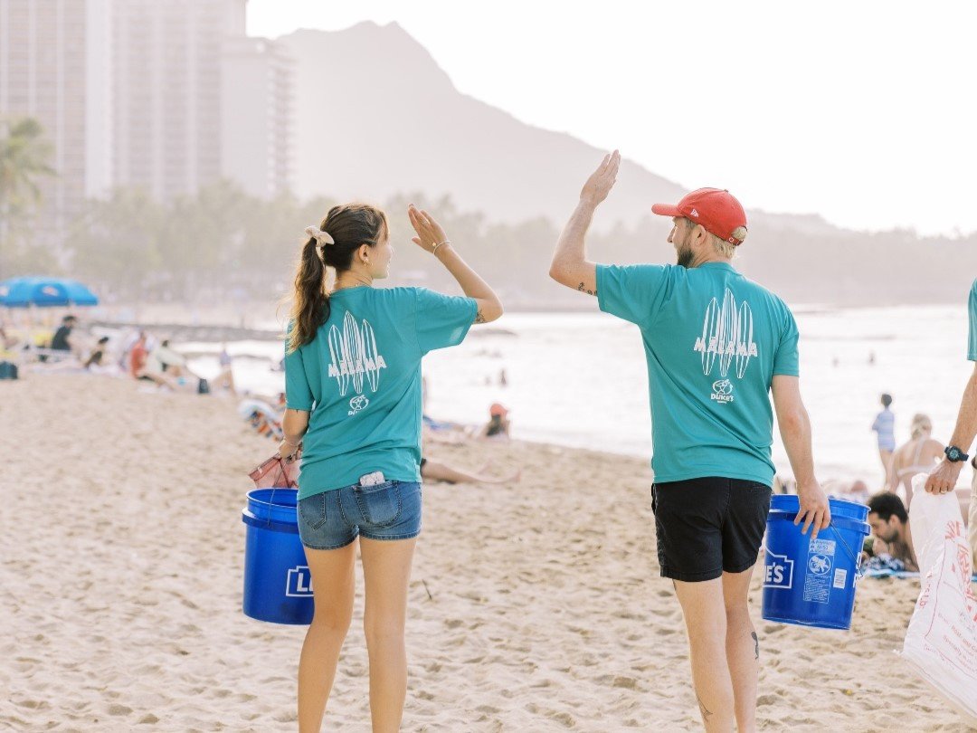 Completing a successful beach cleanup on the iconic Waikiki Beach. 