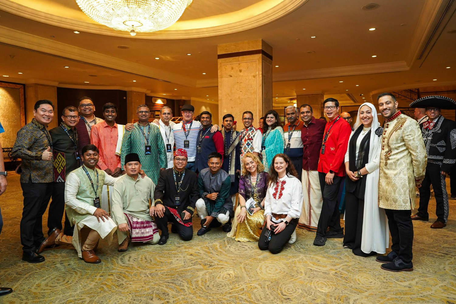 People at Coats wearing their national dresses representing vast diversity.