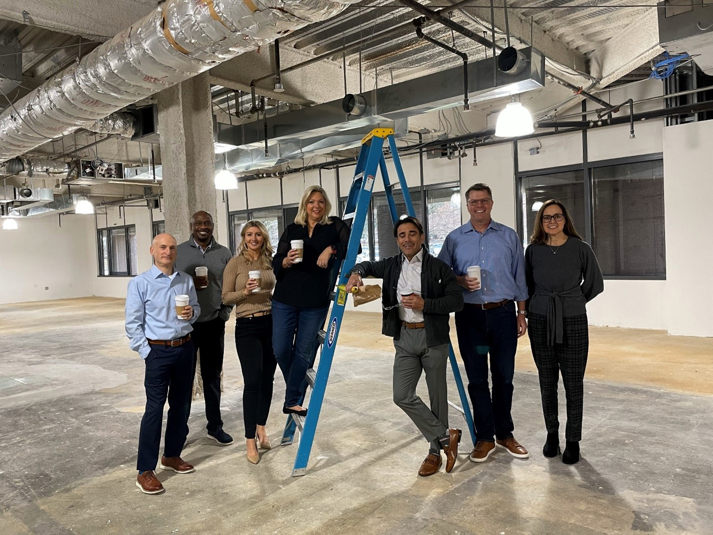 Some of Phathom’s sales leadership team check out the construction and office expansion project at our headquarters.