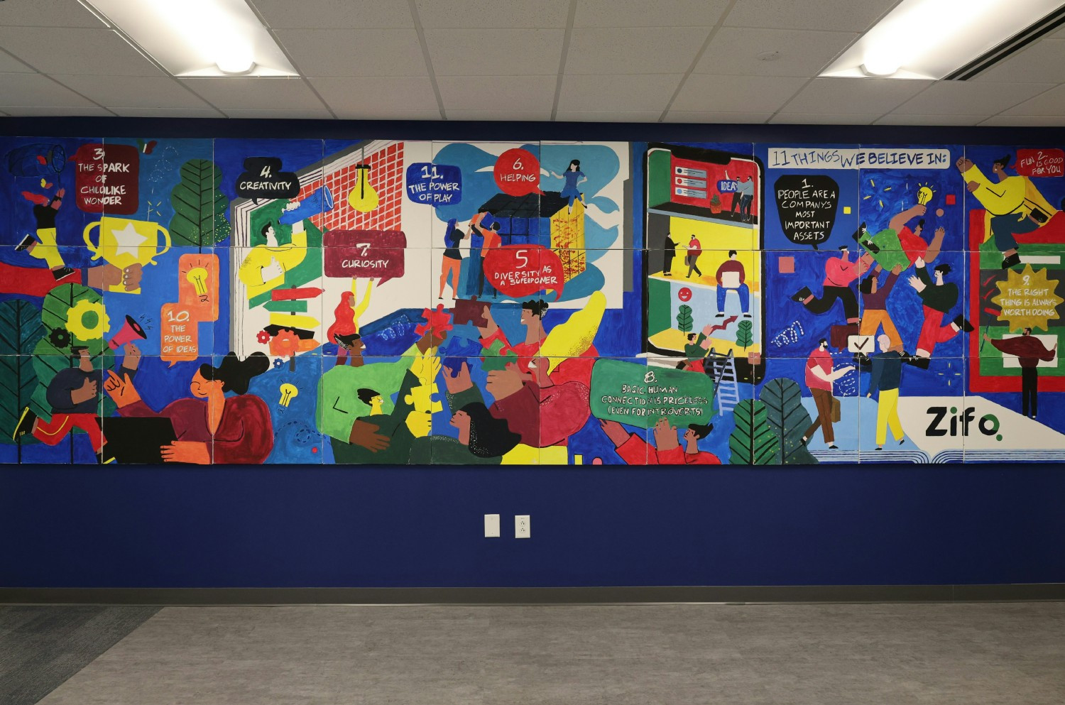 Mural puzzle created by employees