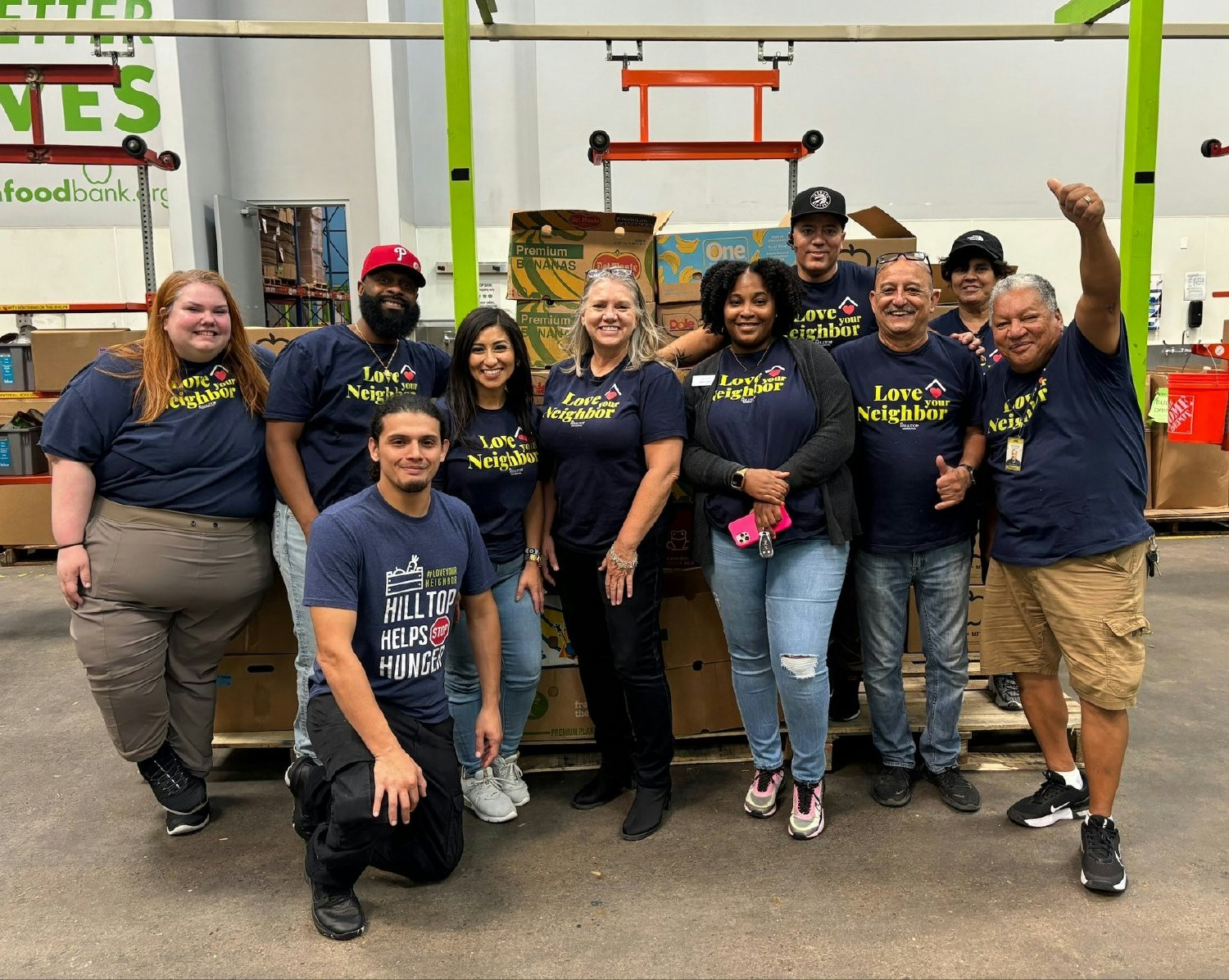 Giving back to the community by volunteering at the local food bank during our love your neighbor initiative. 