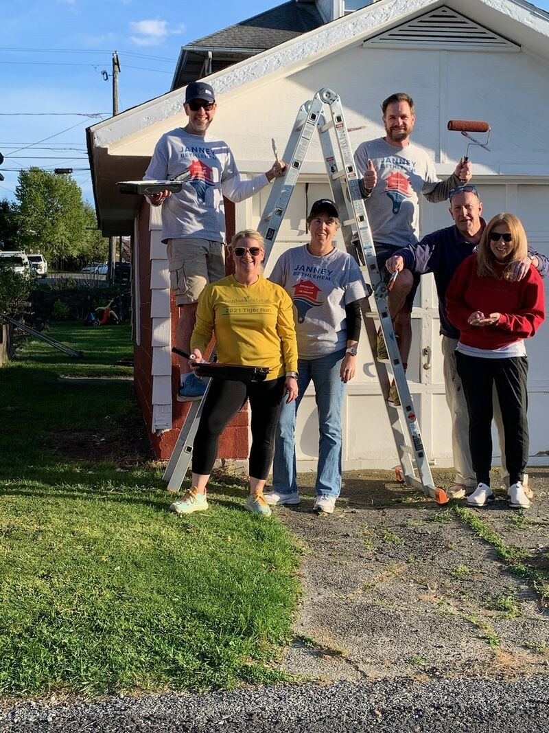 Team Janney helping to paint a local veteran’s home through the “Brush-up Our Veterans” volunteer initiative. 