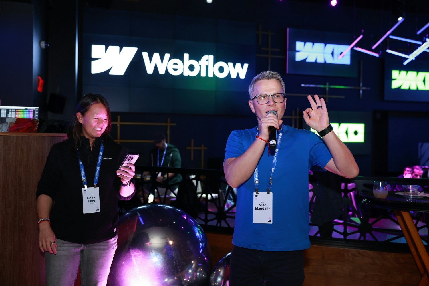 Co-Founder Vlad Magdalin and CEO Linda Tong speaking to the team at Webflow Kick Off